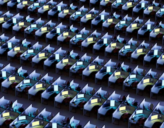 Modern office workspace with computers and networking equipment, symbolizing IT services.