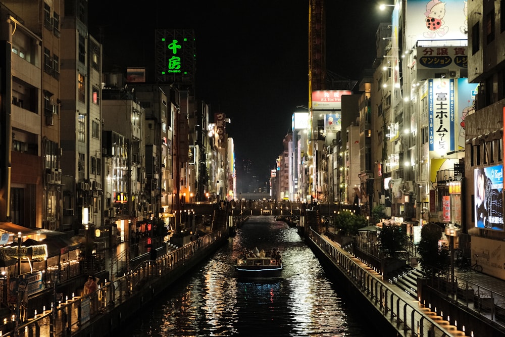 a river running through a city at night