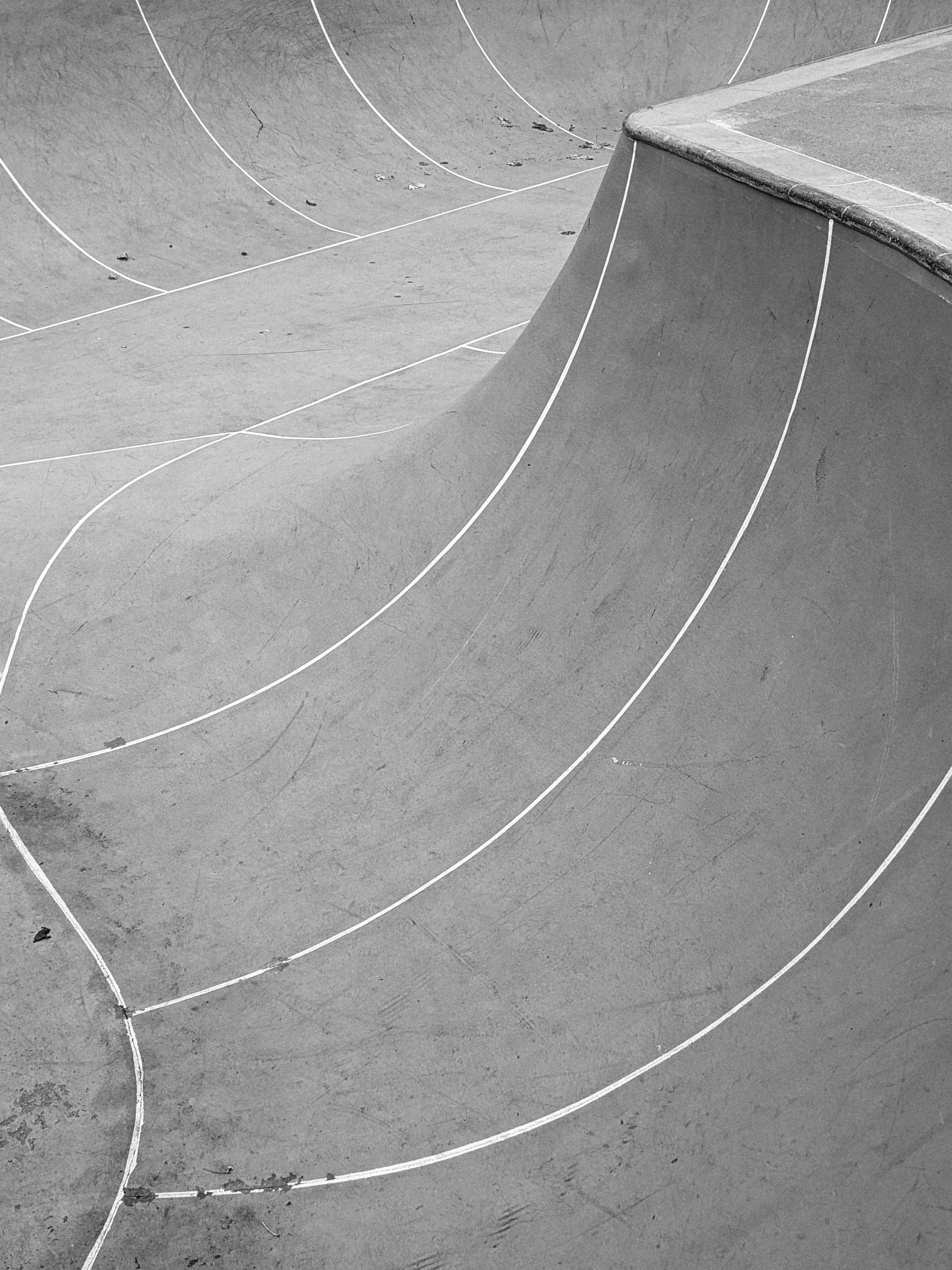 a man riding a skateboard up the side of a ramp
