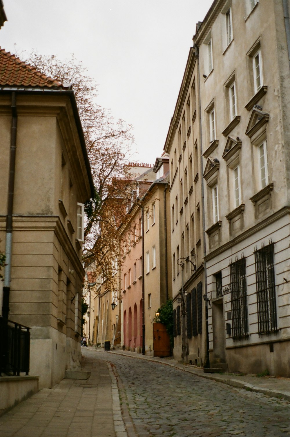 a cobblestone street in a european city