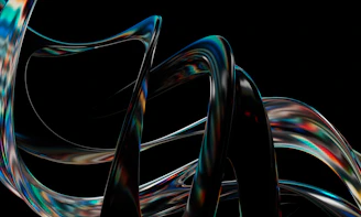 A dynamic 3D animation of swirling colorful ribbons against a dark background
