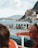 A happy customer enjoying a boat cruise.