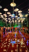 A vibrant public area illuminated with creative lighting designs.