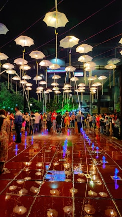 A vibrant public area illuminated with creative lighting designs.