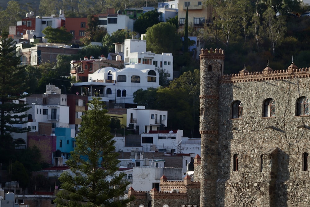 a view of a city from the top of a hill