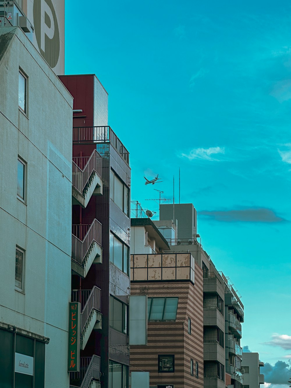 a city street filled with lots of tall buildings