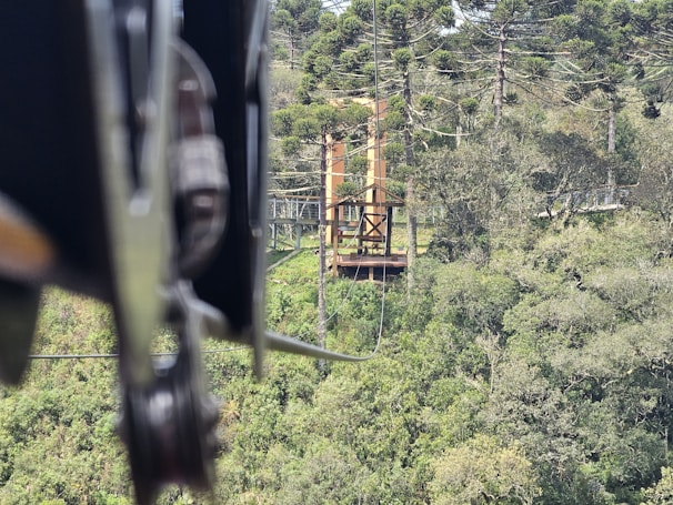 Technicians installing electrical systems surrounded by lush Amazon rainforest.