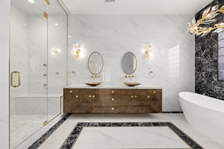 a bathroom with two sinks and a bathtub