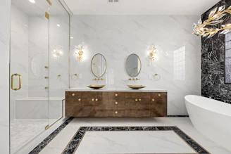 a bathroom with two sinks and a bathtub