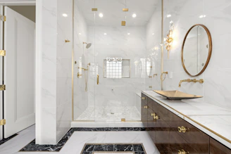 An elegant bathroom featuring a sleek design and luxurious fixtures.