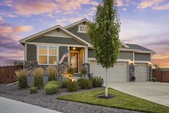 a house with a flag on the front of it