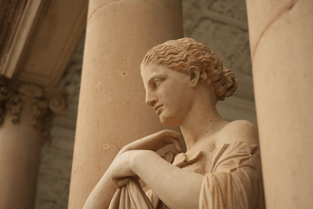 a close up of a statue of a woman