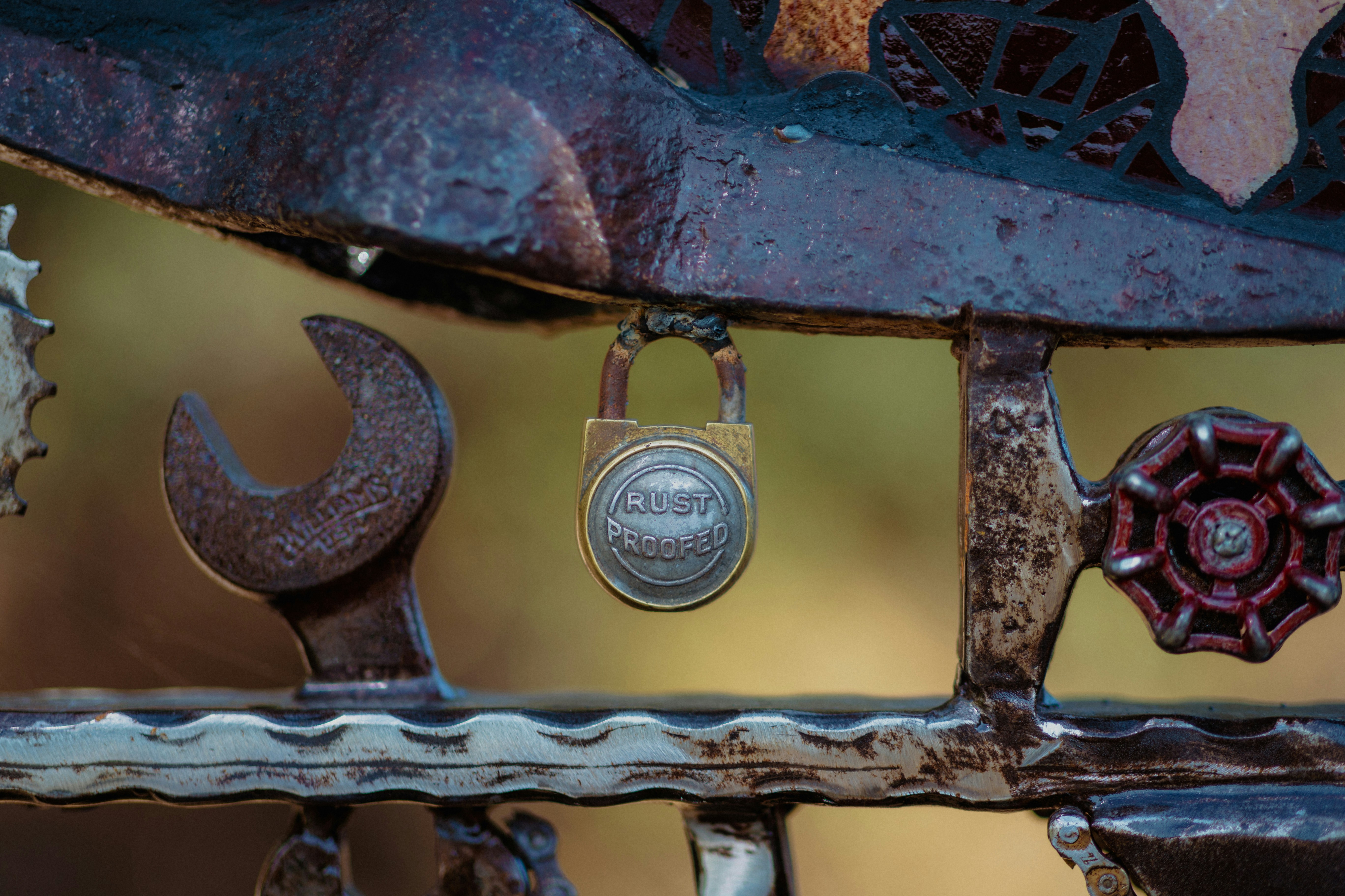 a close up of a bench with a padlock on it