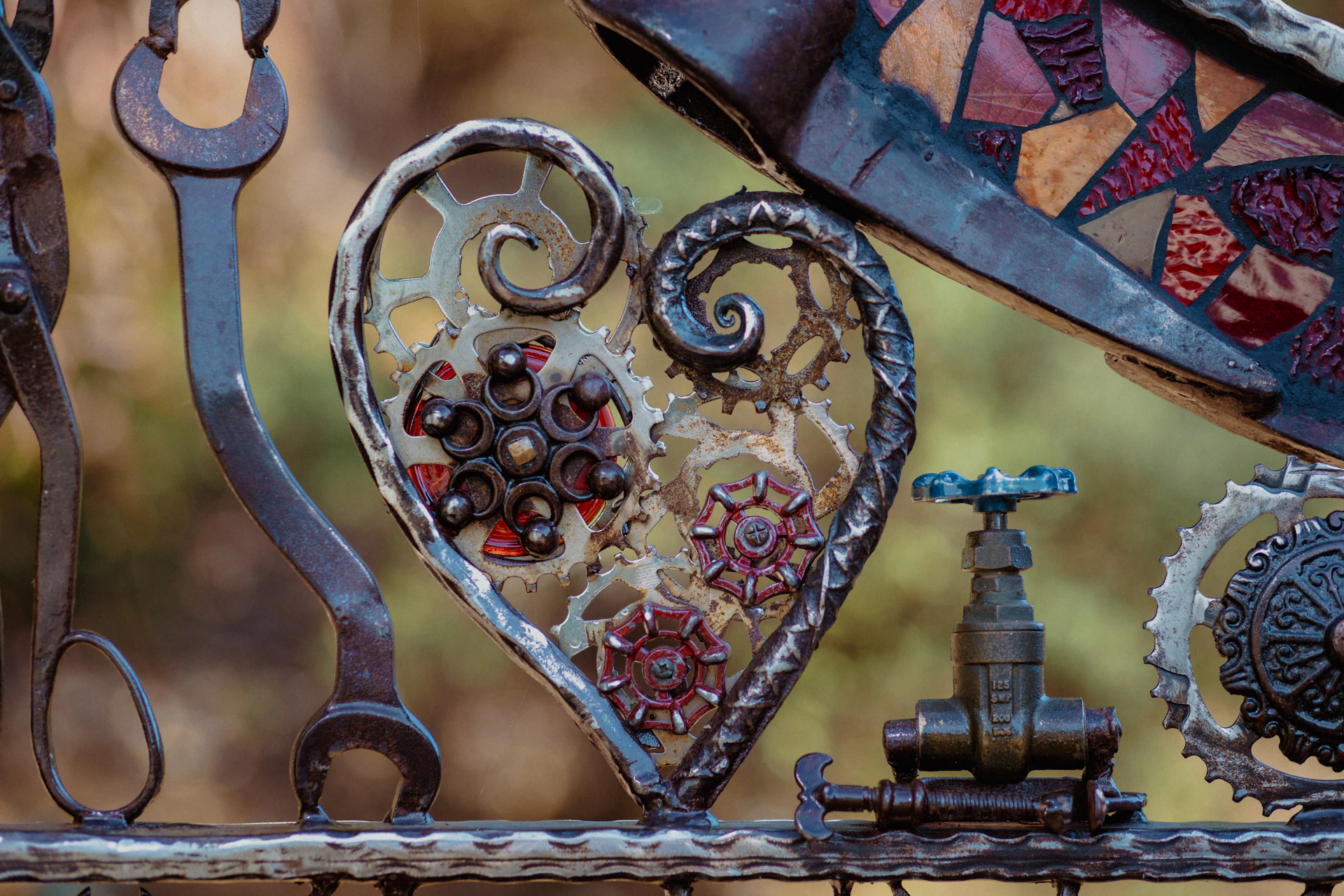 A creative composition of various old tools and scrap pieces welded together, highlighting the transformation from junk to art.