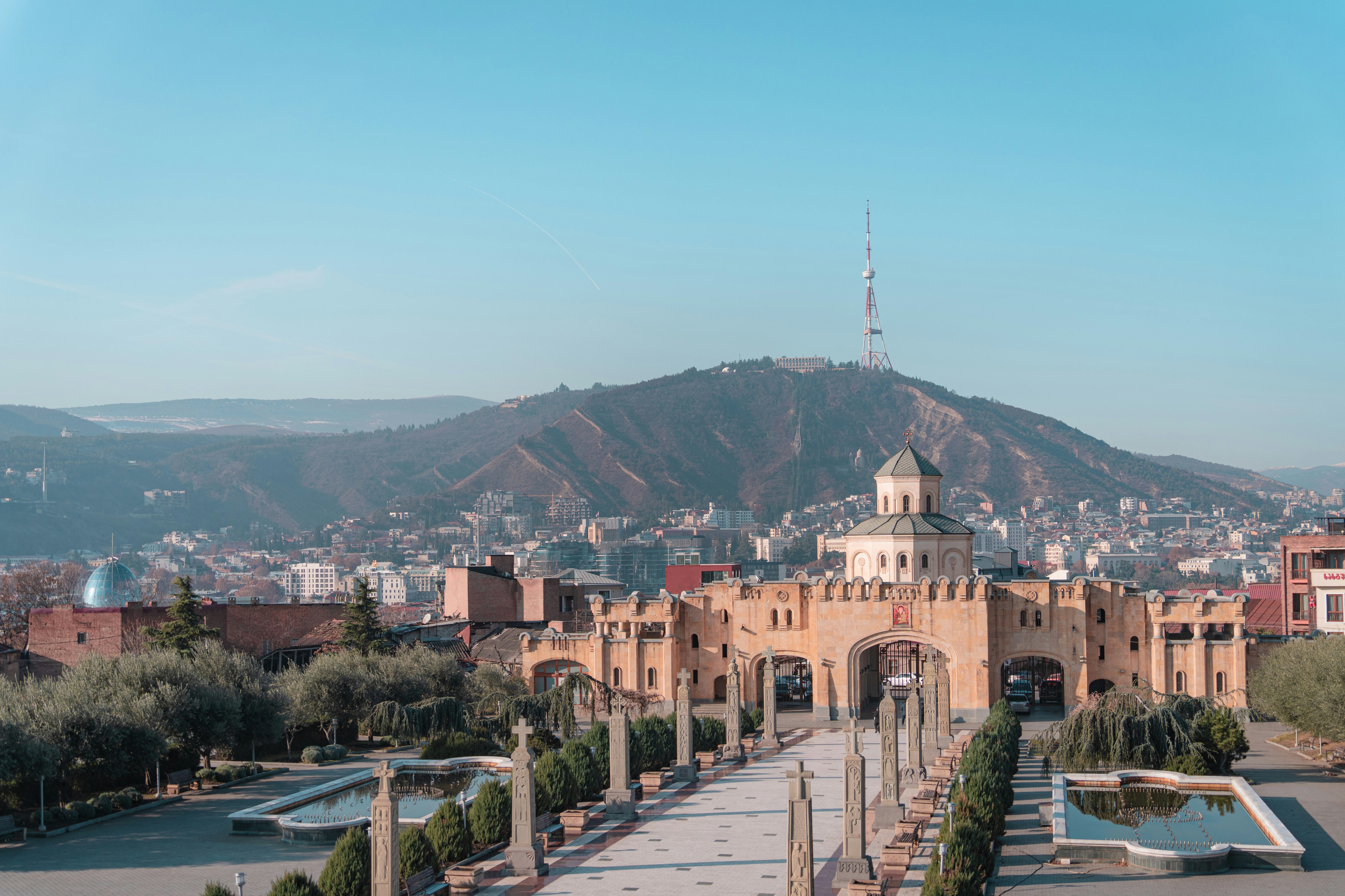 a large building with a clock tower on top of it, 