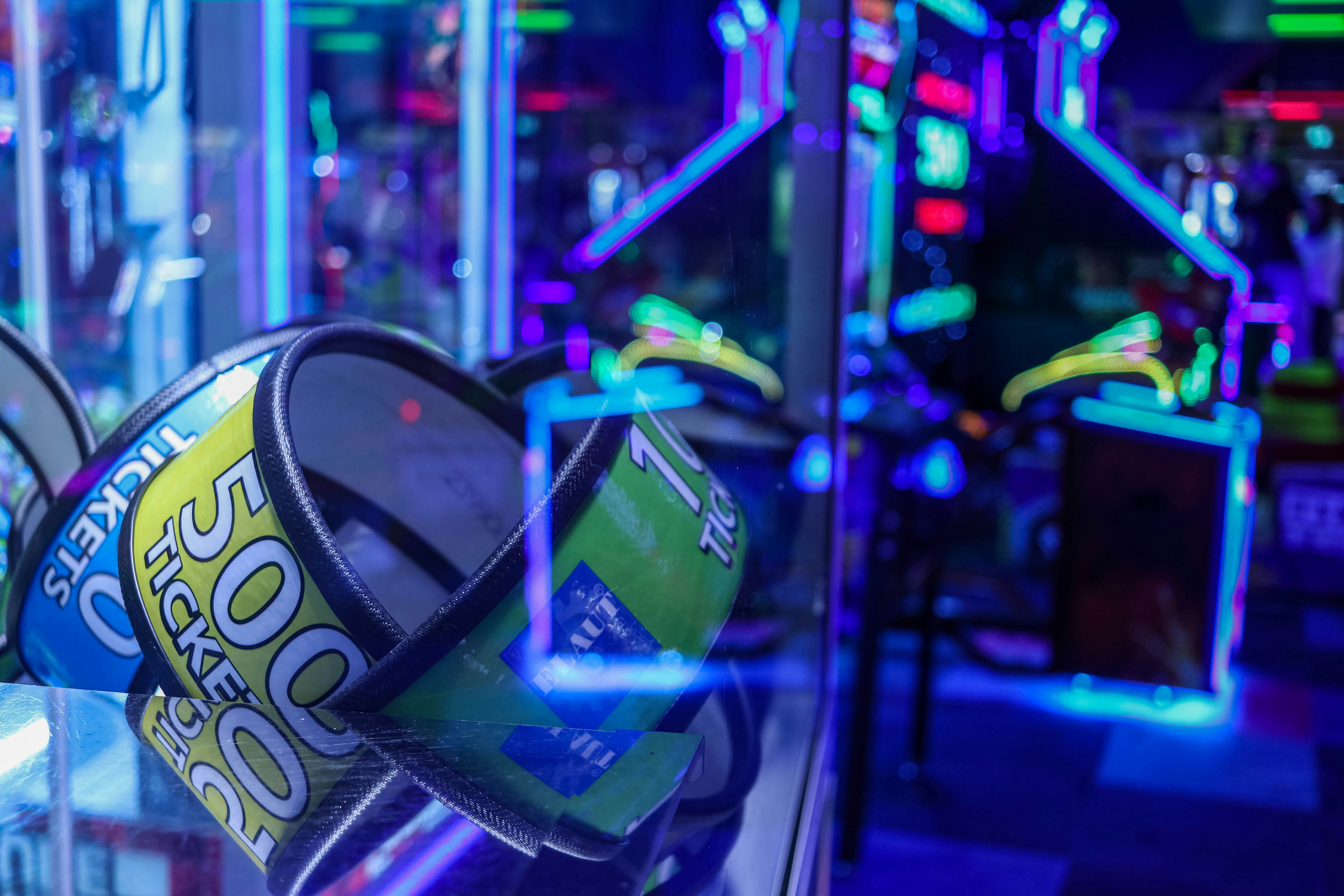 a couple of soda cans sitting on top of a glass table