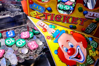 a close up of a machine with a clown face on it