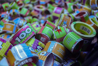 Colorful tickets stacked next to a smiling family enjoying the event.