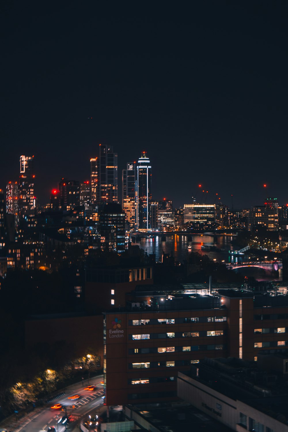 a night view of a city with lots of tall buildings