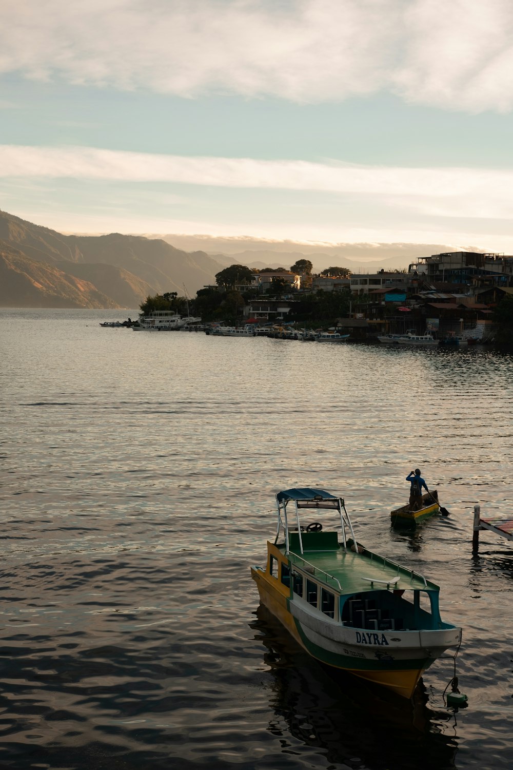 a boat floating on top of a body of water