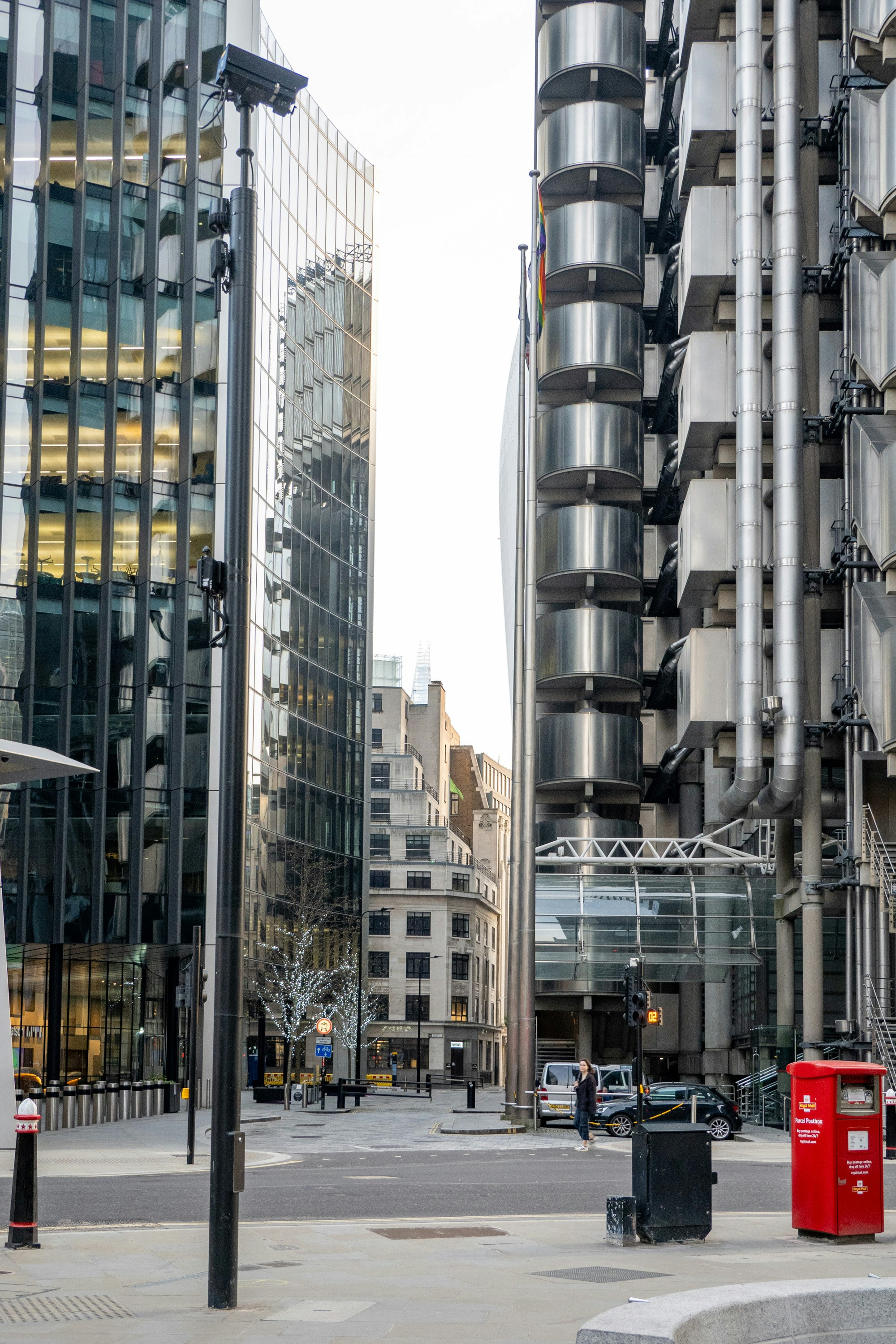 a couple of tall buildings sitting next to each other