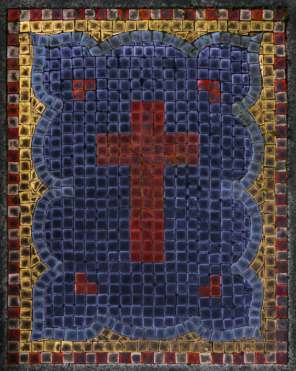 ein Bild von einem roten Kreuz auf blauem Hintergrund
