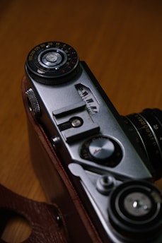 A close-up of a vintage antique being carefully examined by an expert appraiser.