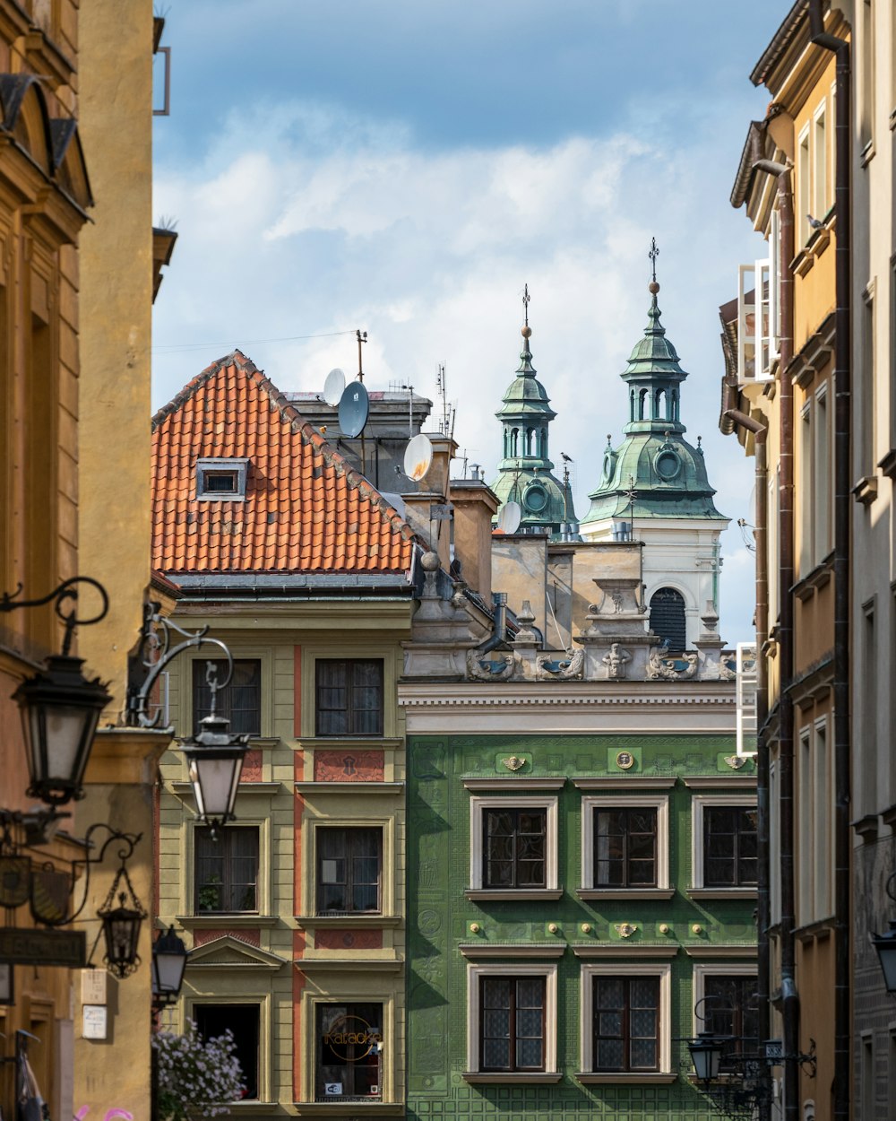 a view of a city street with buildings in the background