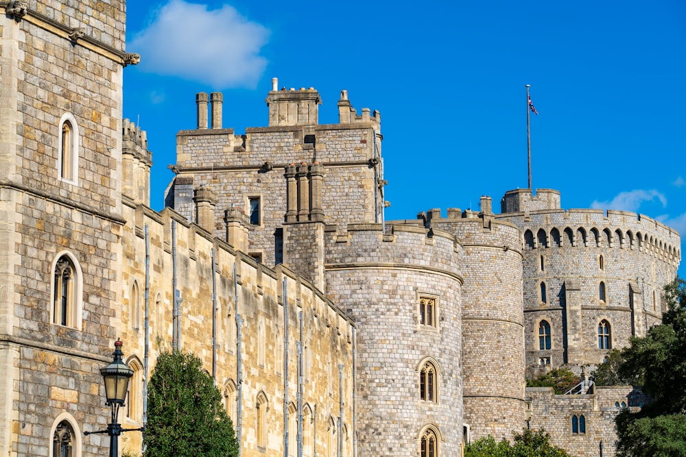 a castle with a clock on the front of it