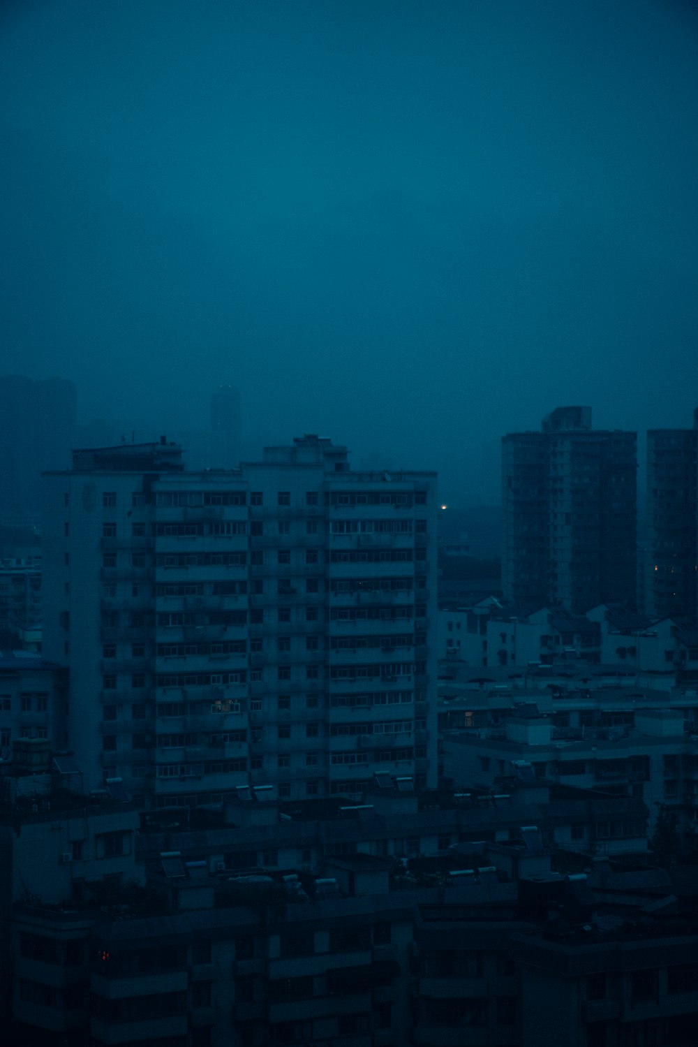 a view of a city at night from a tall building