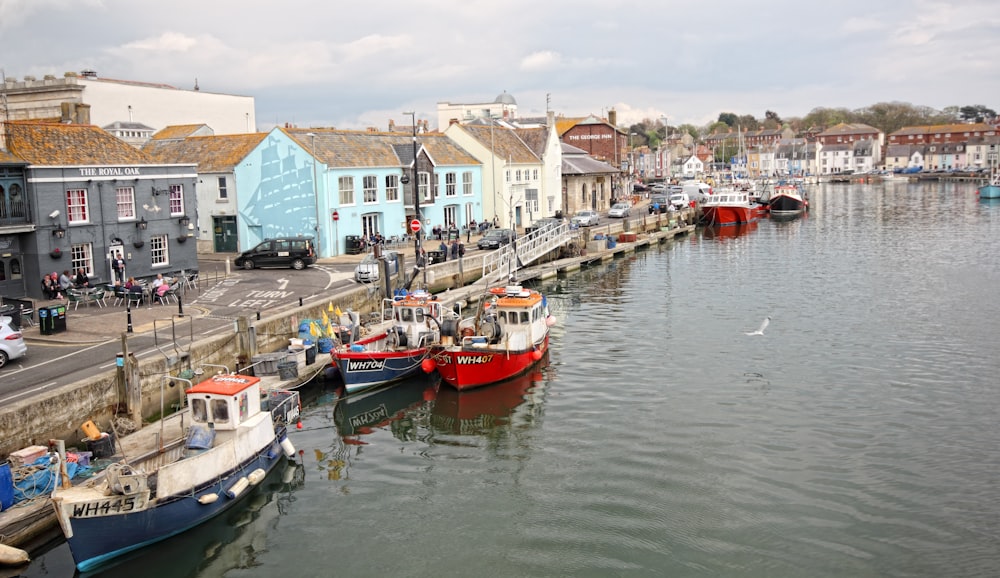 a group of boats that are sitting in the water