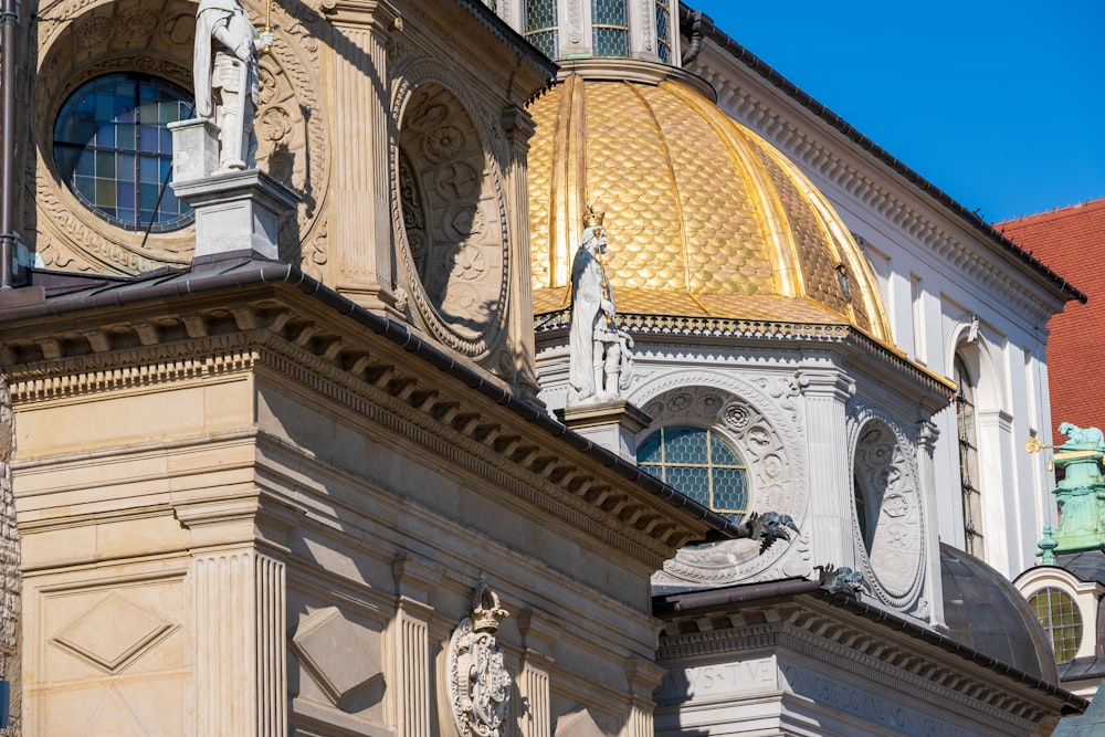 a large building with a golden dome on top of it