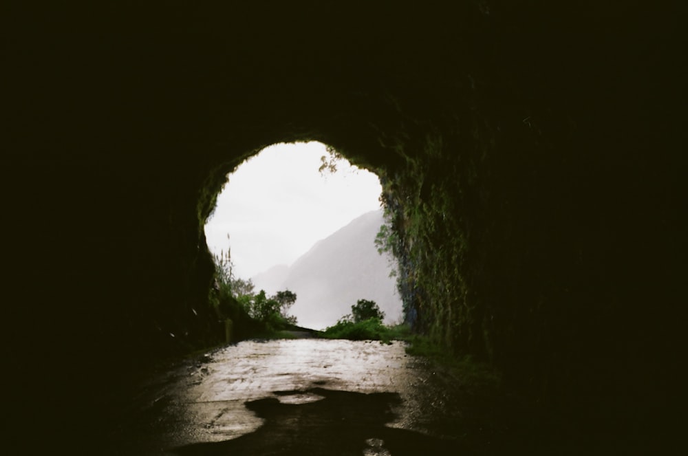 a dark tunnel with a light at the end