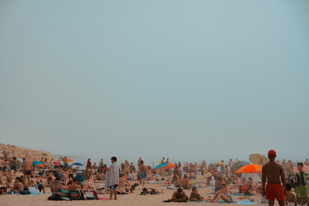 a large group of people on a beach