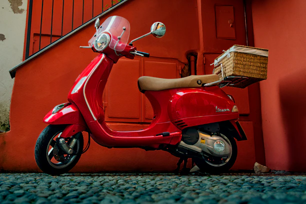 Electric scooter being delivered to a stylish Marrakech riad entrance.