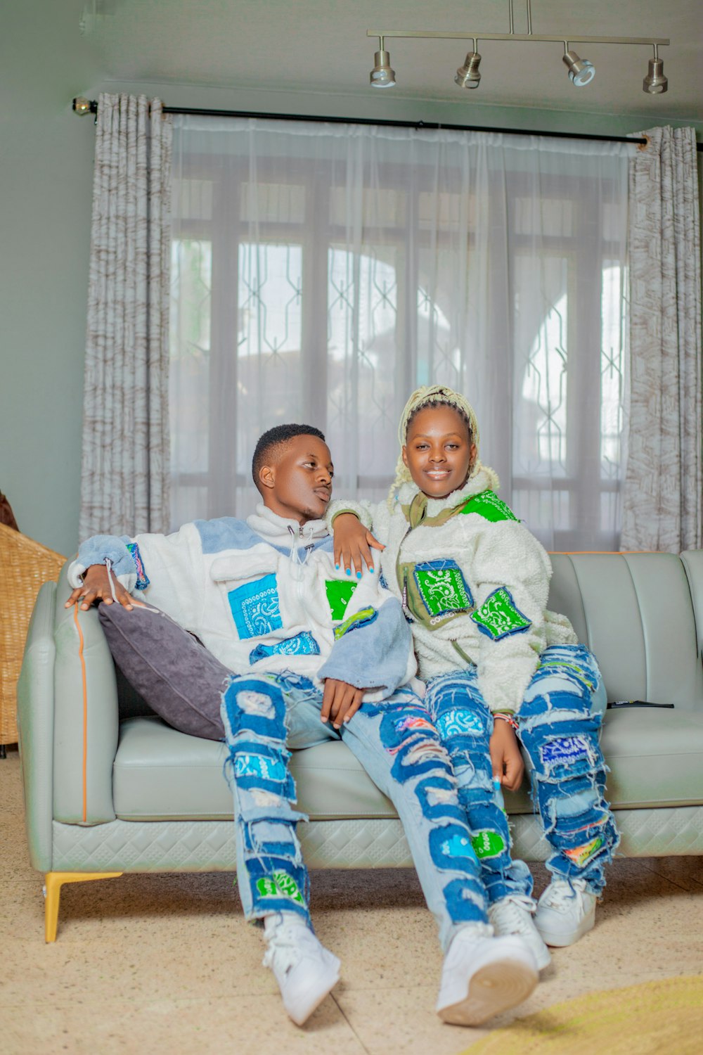 a man and a woman sitting on a couch