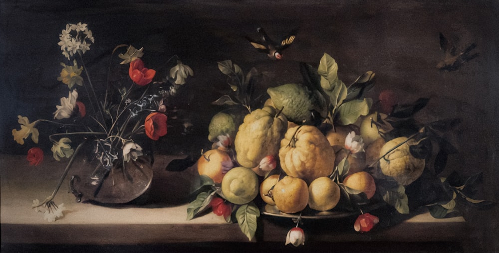 uma pintura de frutas e flores sobre uma mesa