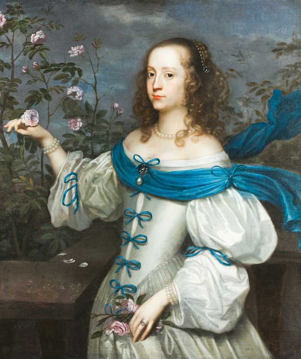 a painting of a woman holding a flower