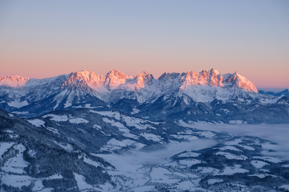 a view of a mountain range at sunset