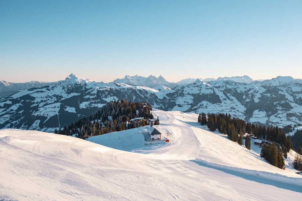 a person on a snowboard on a snowy mountain