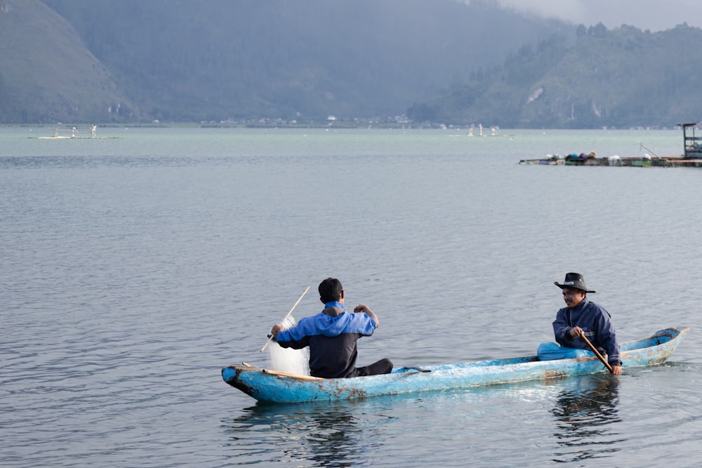 a couple of people that are in some water