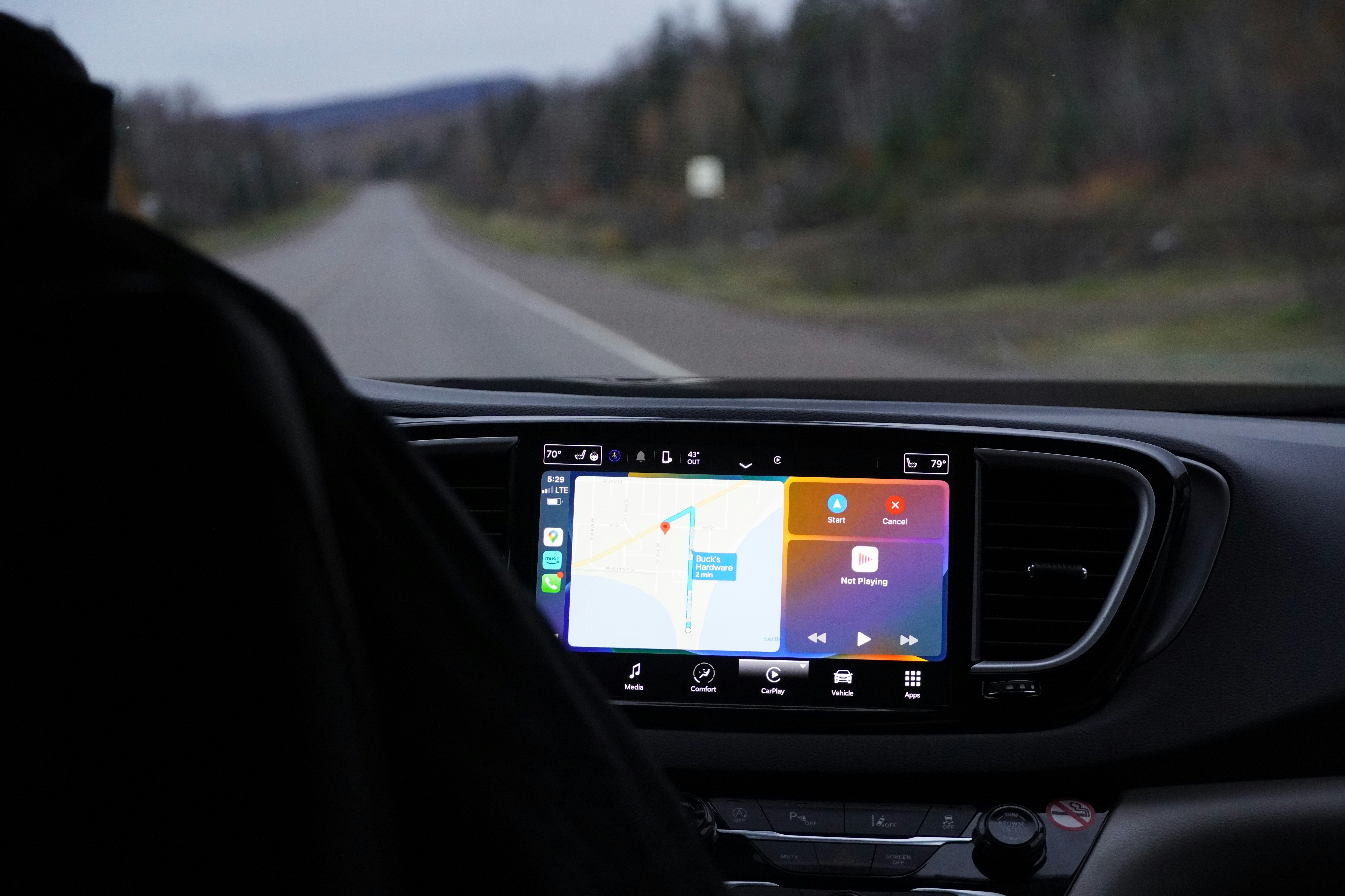 Electric vehicle dashboard showing charging status and power on screen