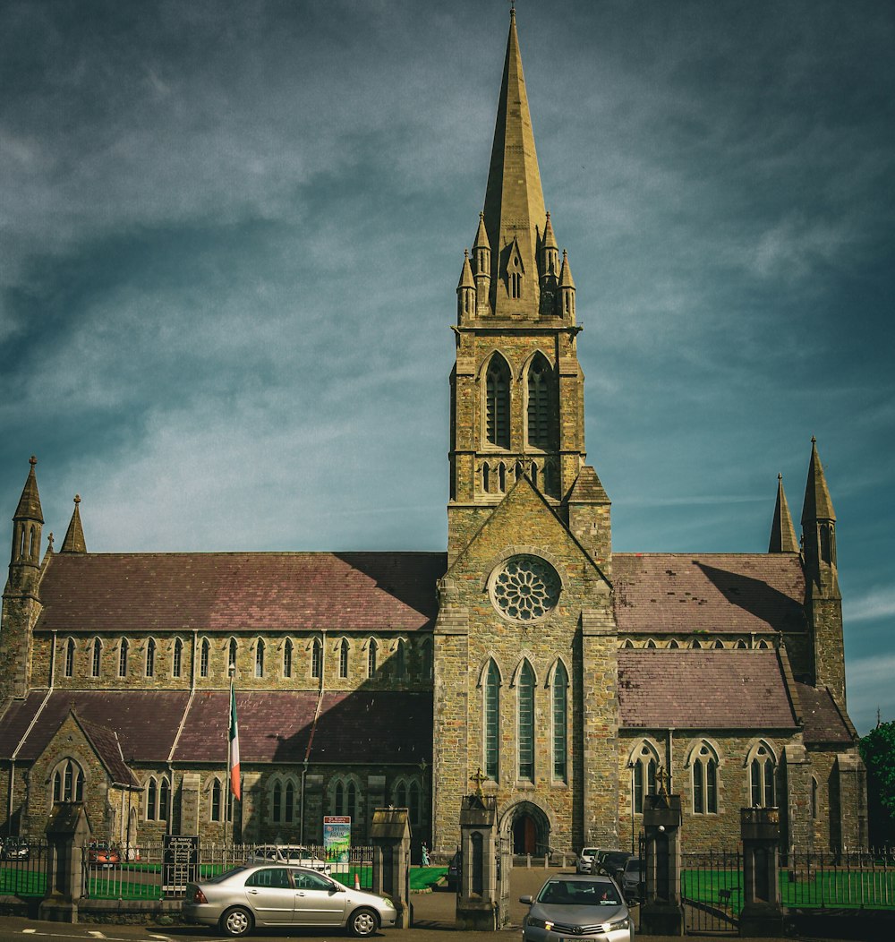 a church with a car parked in front of it