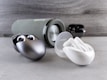 A collection of Bluetooth speakers in various designs and colors.