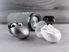 A collection of Bluetooth speakers in various designs and colors.