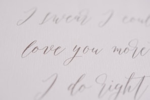 Personalized décor piece with soft peach tones and elegant script lettering on cream background.