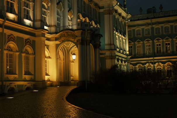 Elegant architectural detail of a luxury residential complex with warm lighting