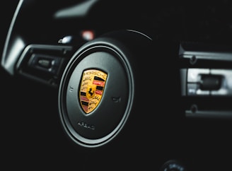 Interior shot of the Porsche 911 GT3, focusing on the steering wheel and dashboard details.