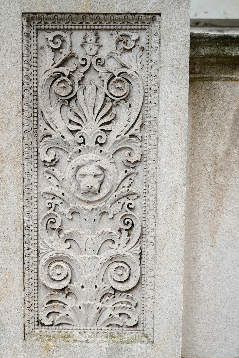 a close up of a decorative wall on a building