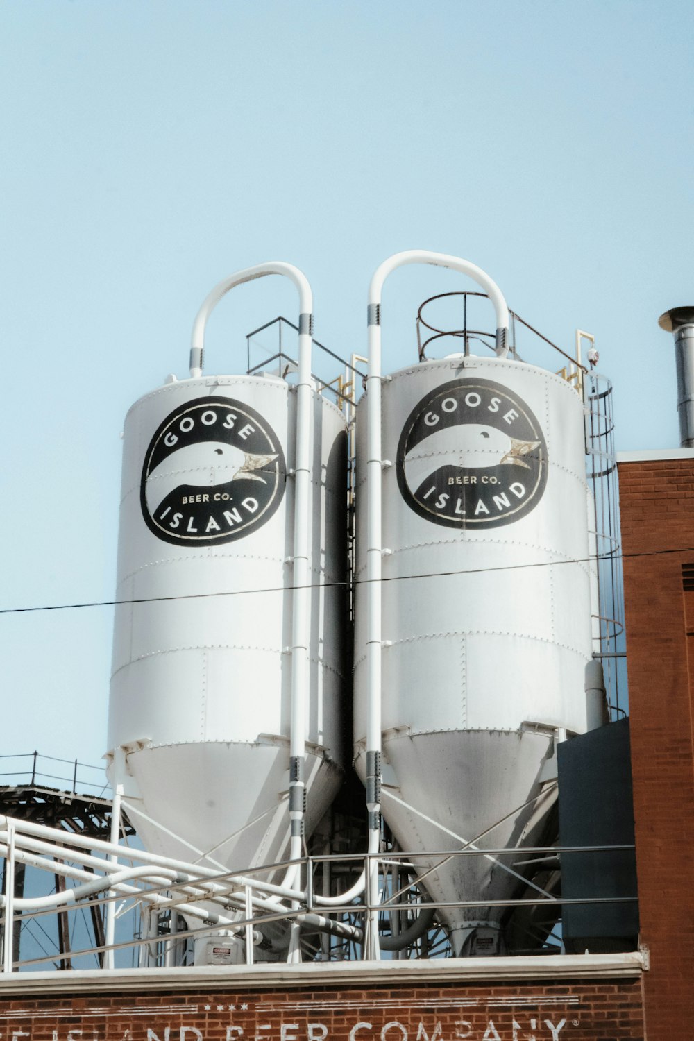 a couple of silos sitting on top of a building